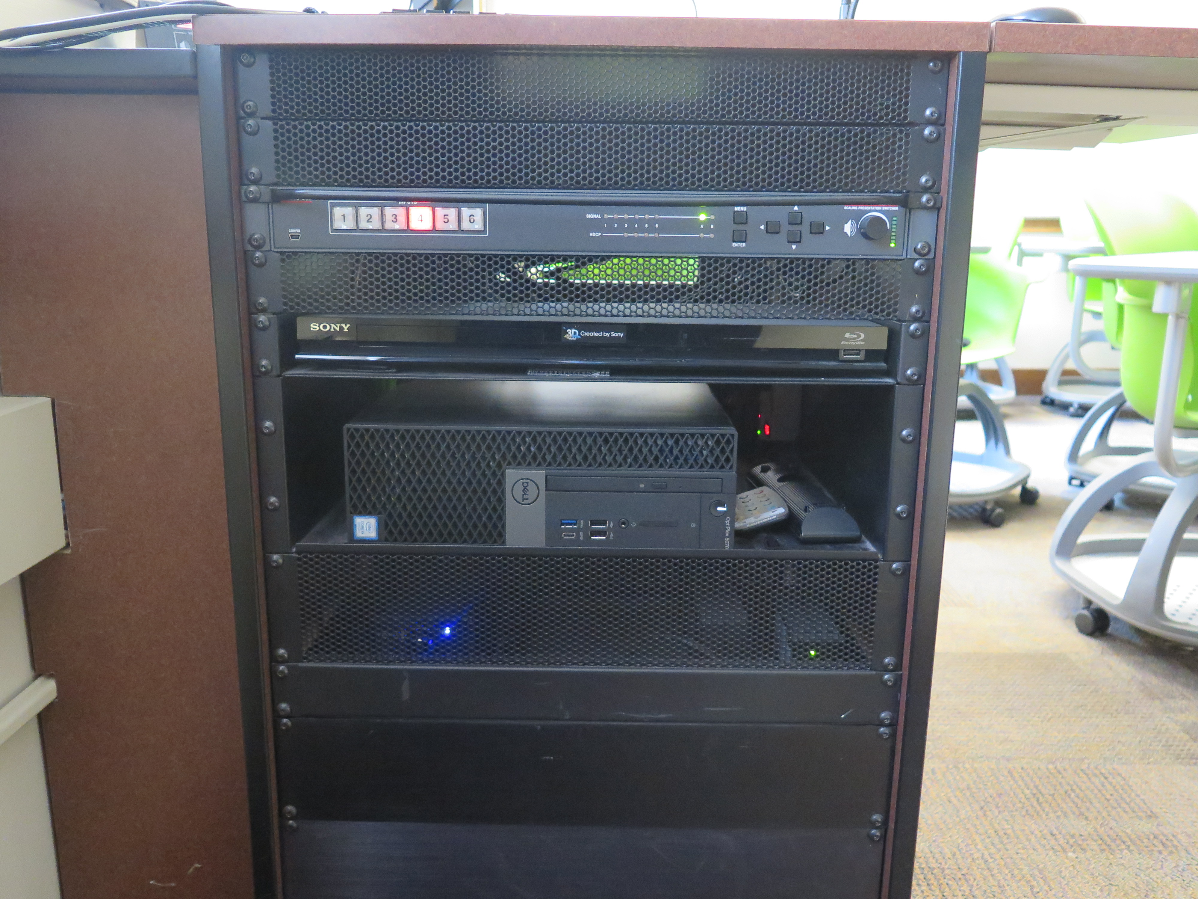 Front of Equipment rack showing AV Switcher. Below that is Blue-Ray/DVD Player. On the bottom is the the Dell Computer CPU.