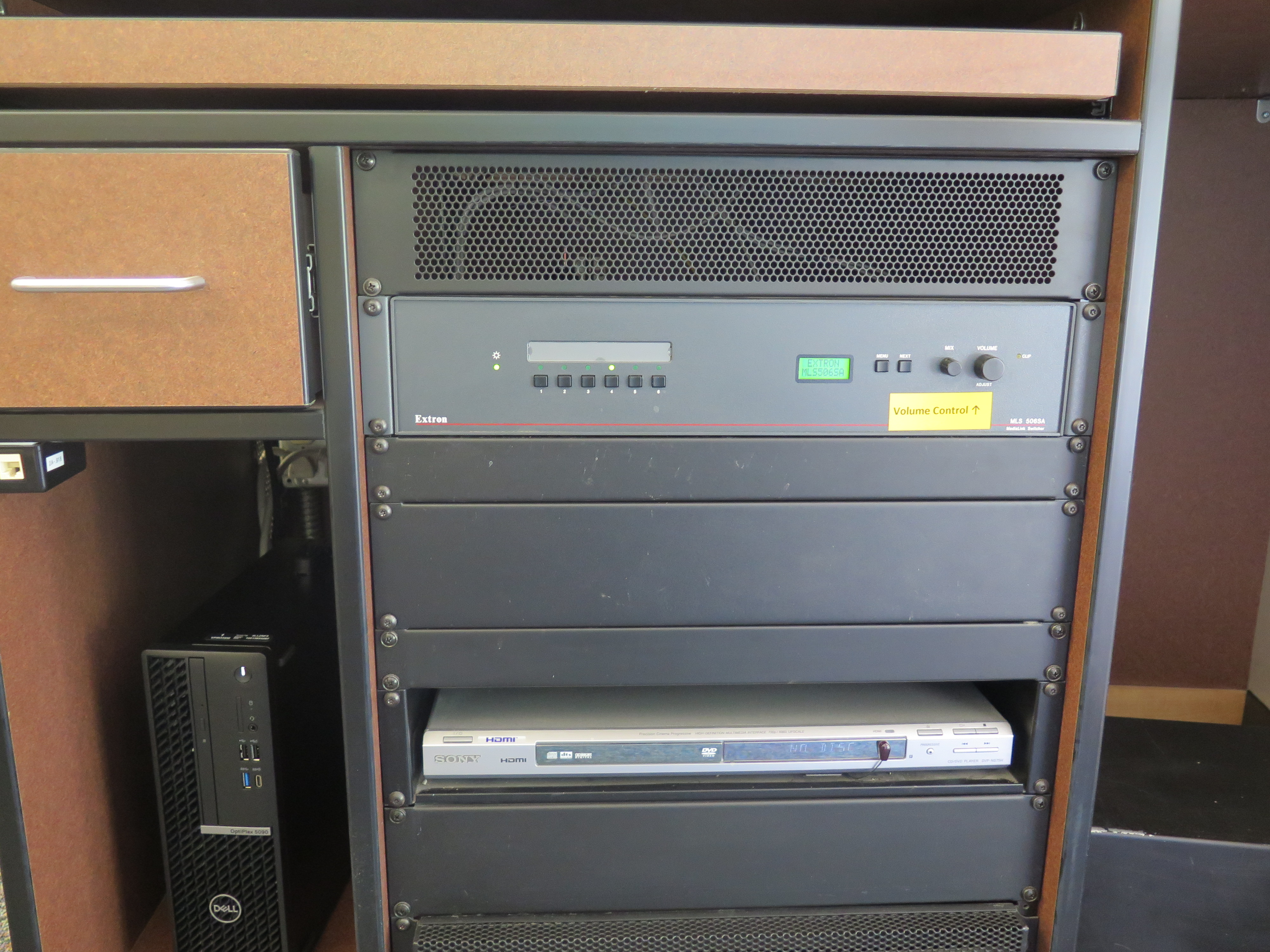 Display rack consists of a AV controller, DVD player and Dell Computer CPU.