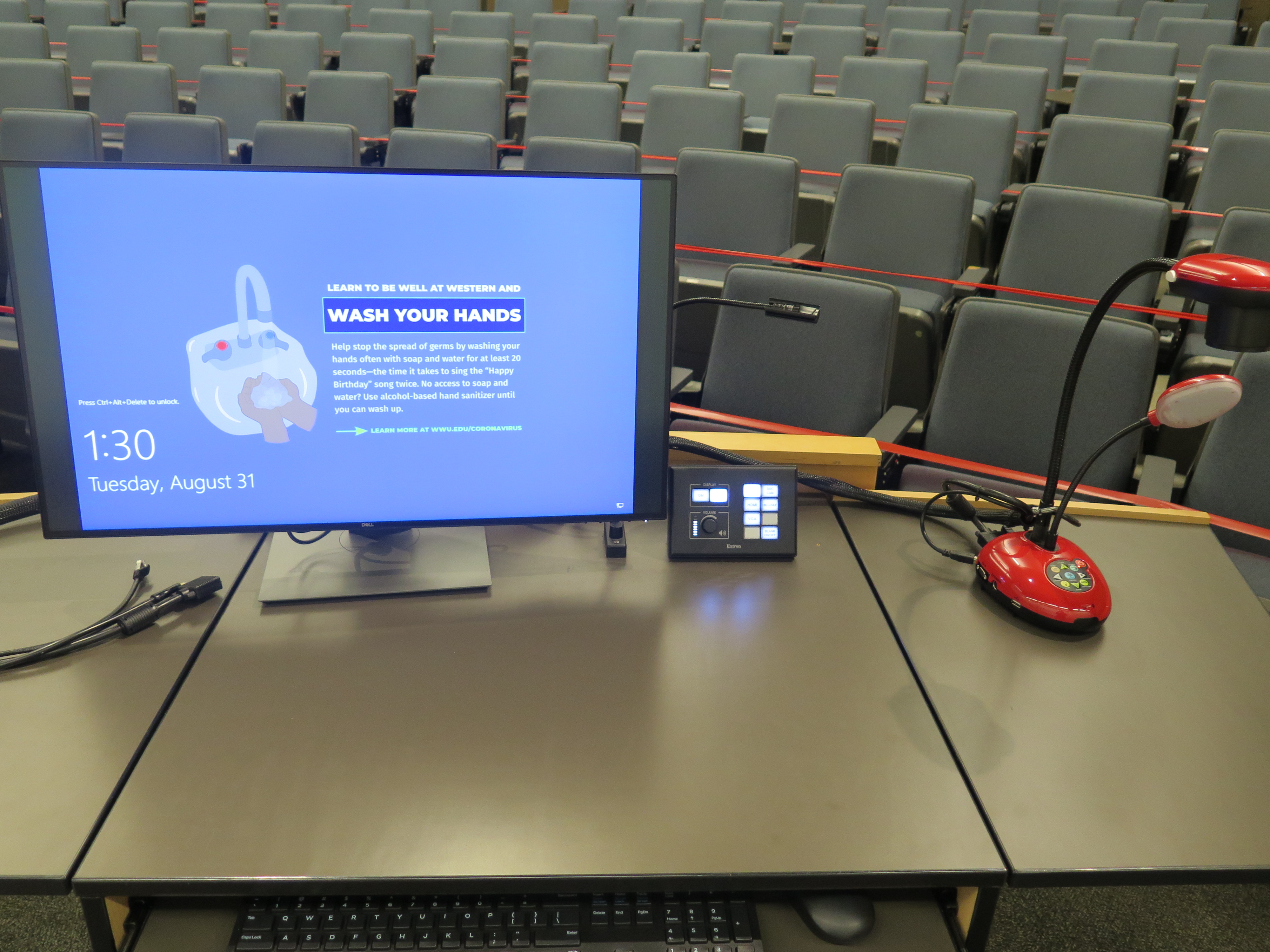 top of podium showing monitor, control system and document camera