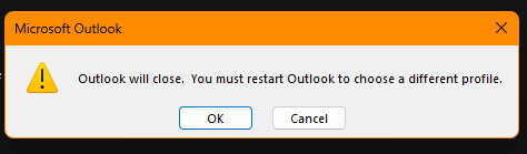 A screenshot displaying the Outlook popup which reads "Outlook will close. You must restart Outlook to choose a different profile." The OK button is highlighted.